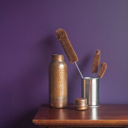 Ecomax bottle brushes in tin can with water bottle