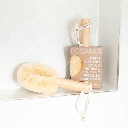 Ecomax White spa body brush on shower shelf