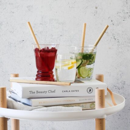 Ever eco bamboo drinking straws in drink glasses on bench