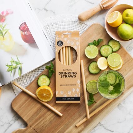 Ever eco bamboo drinking straws in packaging on cutting board with food